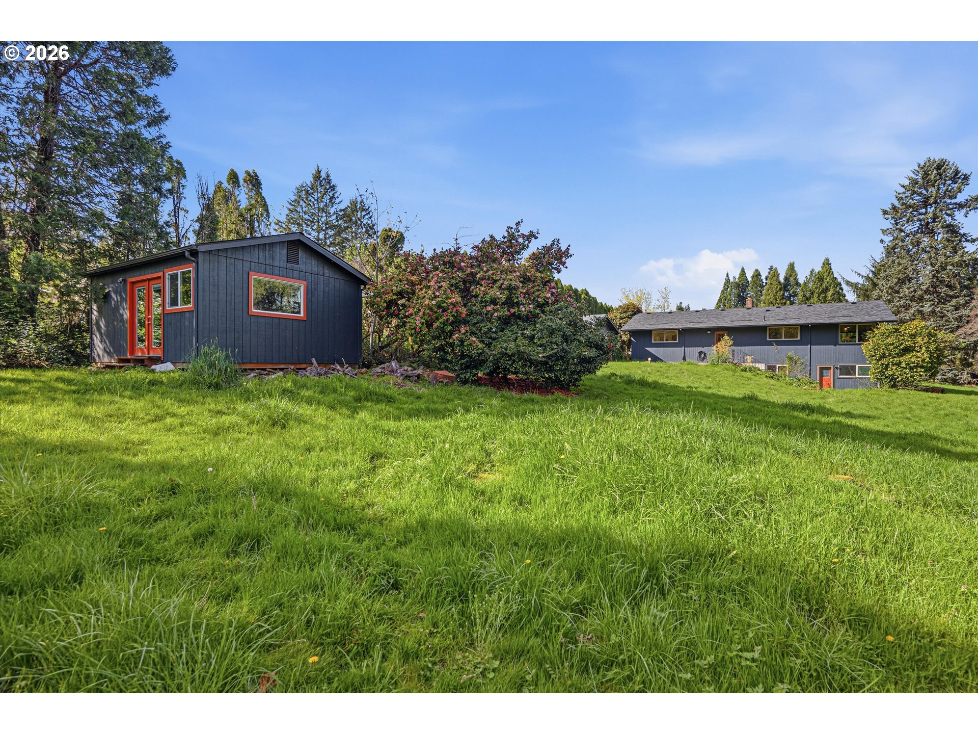12802 Southeast Knapp Street Portland, OR 97236 - Photo 44 of 48 a view of a house with a yard