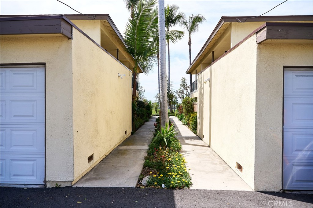 12310 La Pomelo Road La Mirada, CA 90638 - Photo 14 of 30 a view of a pathway of a house with a small yard