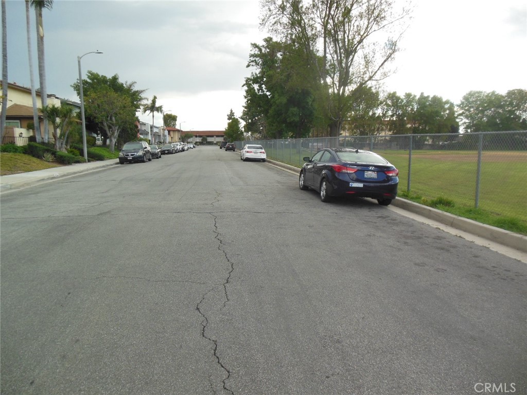 12310 La Pomelo Road La Mirada, CA 90638 - Photo 19 of 30 a view of street with parked cars