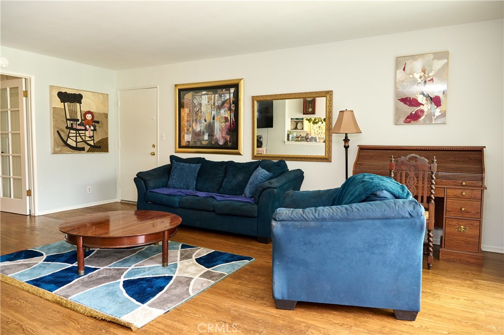 12310 La Pomelo Road La Mirada, CA 90638 - Photo 20 of 30 a living room with furniture and a rug