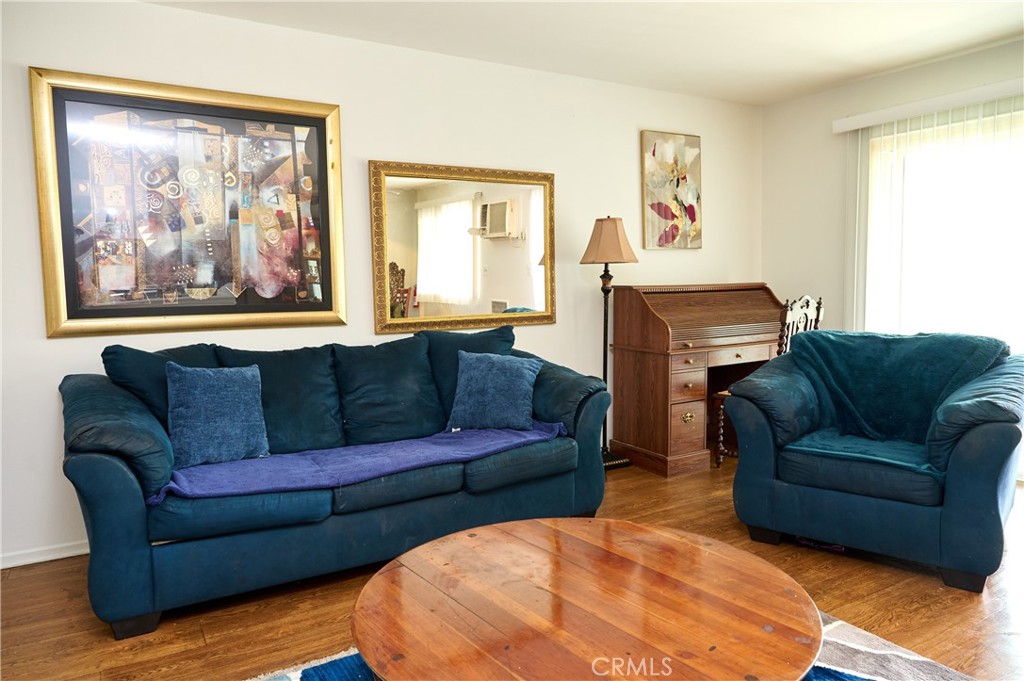 12310 La Pomelo Road La Mirada, CA 90638 - Photo 21 of 30 a living room with furniture and a large window