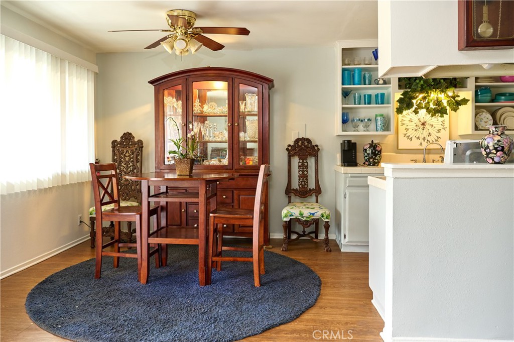 12310 La Pomelo Road La Mirada, CA 90638 - Photo 22 of 30 a view of a dining room with furniture and a chandelier