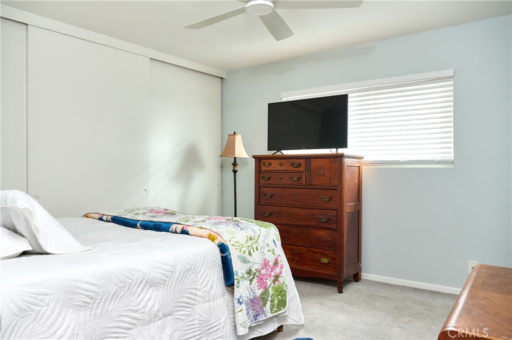 12310 La Pomelo Road La Mirada, CA 90638 - Photo 24 of 30 a bedroom with a bed and a television