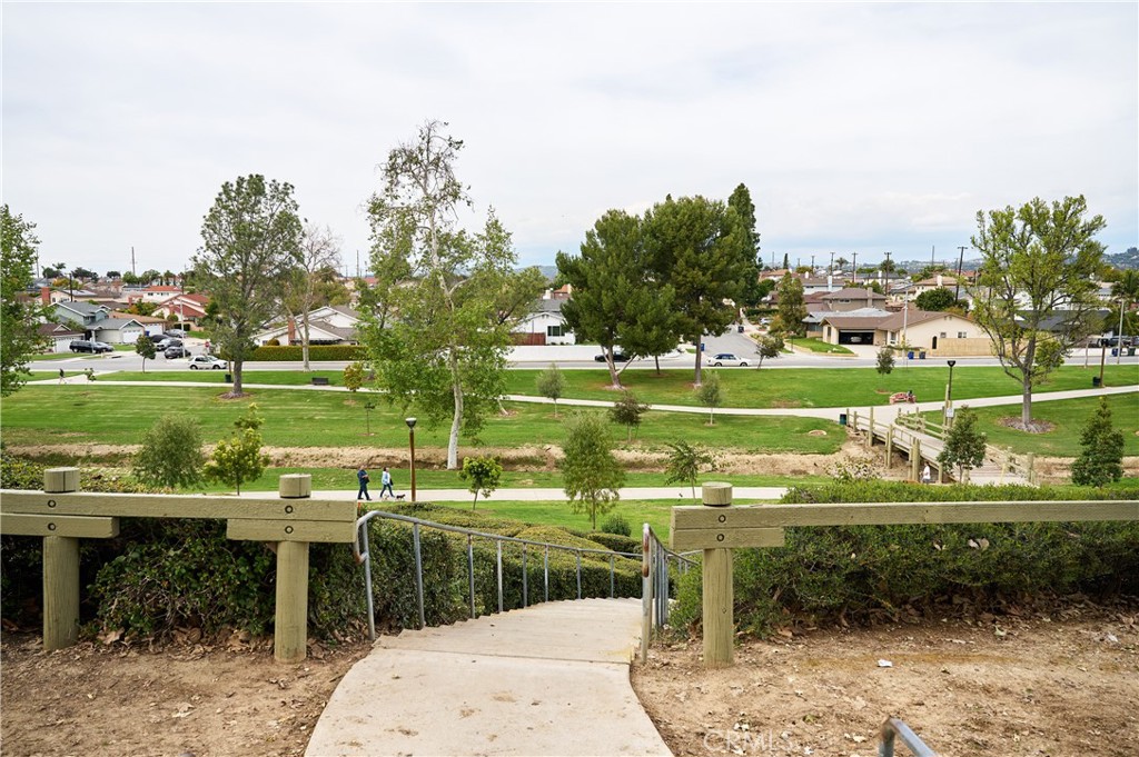 12310 La Pomelo Road La Mirada, CA 90638 - Photo 28 of 30 a backyard of a house with a garden and outdoor seating