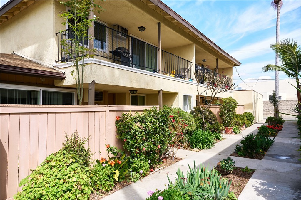 12310 La Pomelo Road La Mirada, CA 90638 - Photo 8 of 30 a front view of a house with a garden