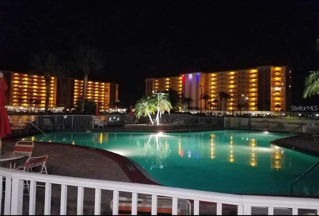 4775 Cove Circle, Unit 403 St. Petersburg, FL 33708 - Photo 31 of 42 a view of swimming pool from balcony