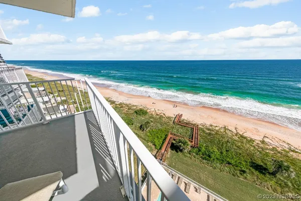 a view of an ocean from a balcony