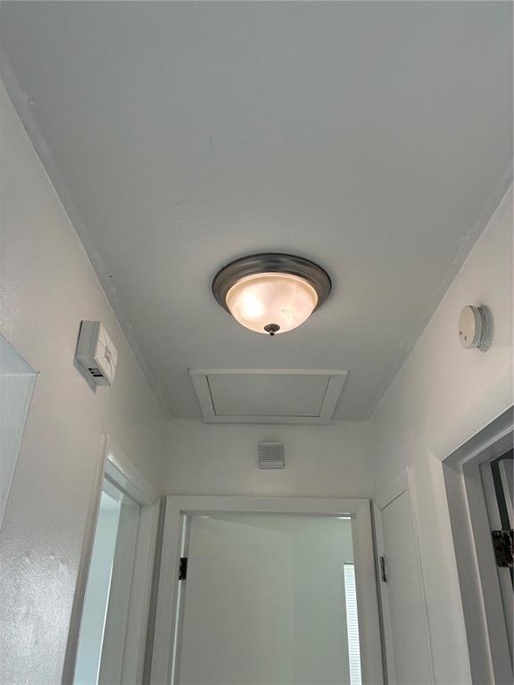 1500 Daroca Drive Deltona, FL 32725 - Photo 12 of 22 a bathroom with a sink and a mirror