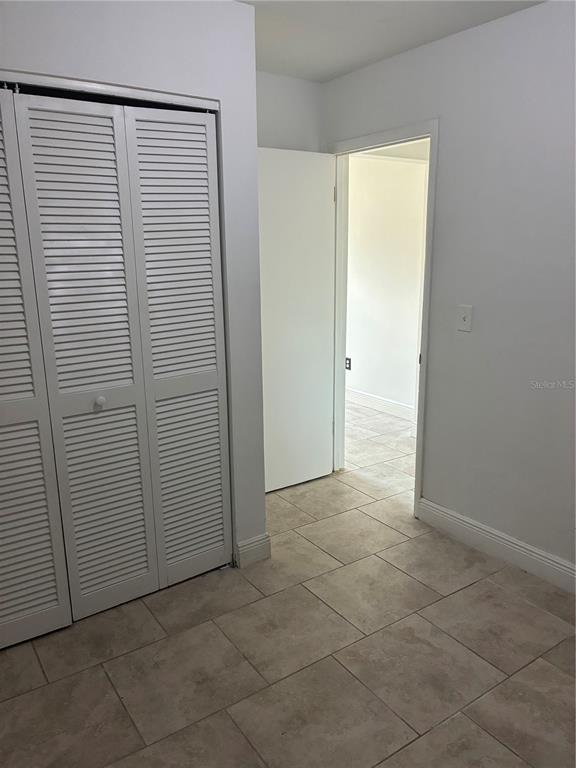 1500 Daroca Drive Deltona, FL 32725 - Photo 14 of 22 an empty room with closet