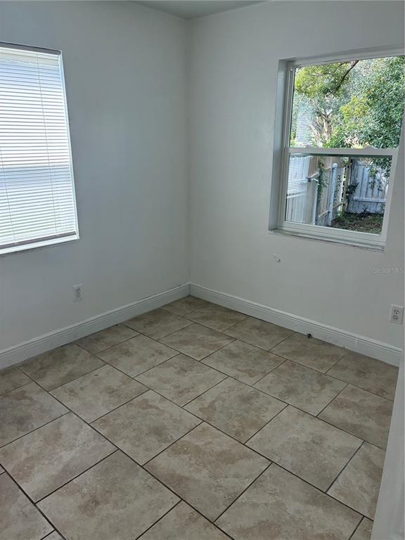 1500 Daroca Drive Deltona, FL 32725 - Photo 9 of 22 a view of an empty room with a window