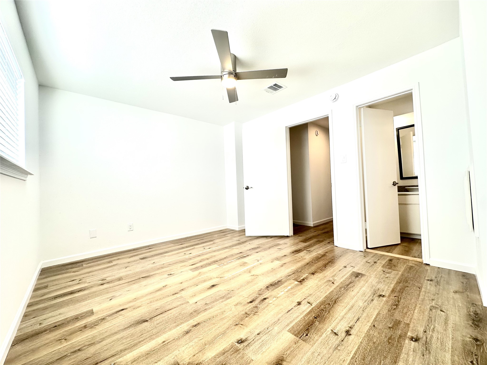 14771 Perthshire Road Houston, TX 77079 - Photo 18 of 23 a view of a livingroom with wooden floor