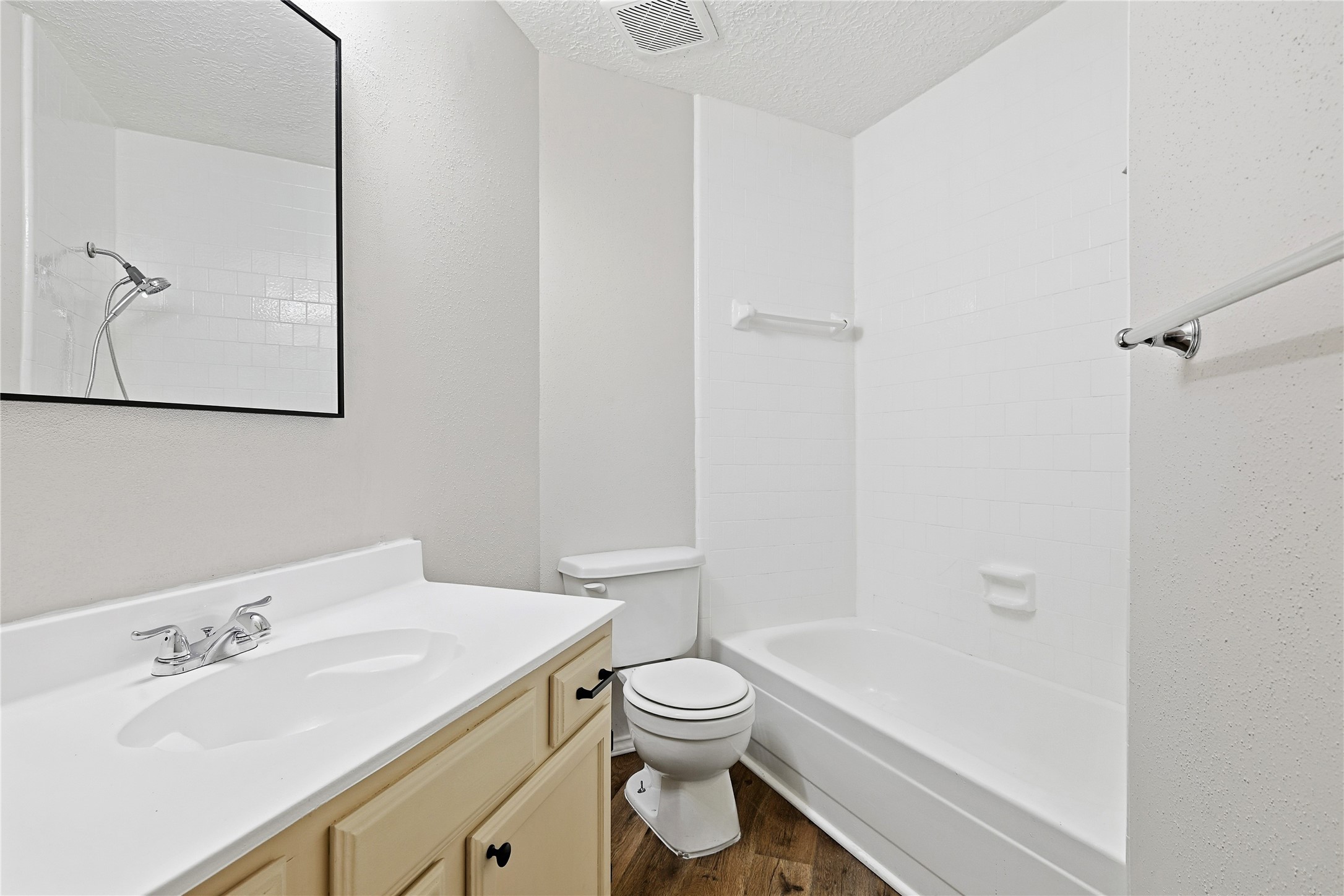 19006 Keyturn Lane Humble, TX 77346 - Photo 12 of 21 a bathroom with a sink a toilet and shower