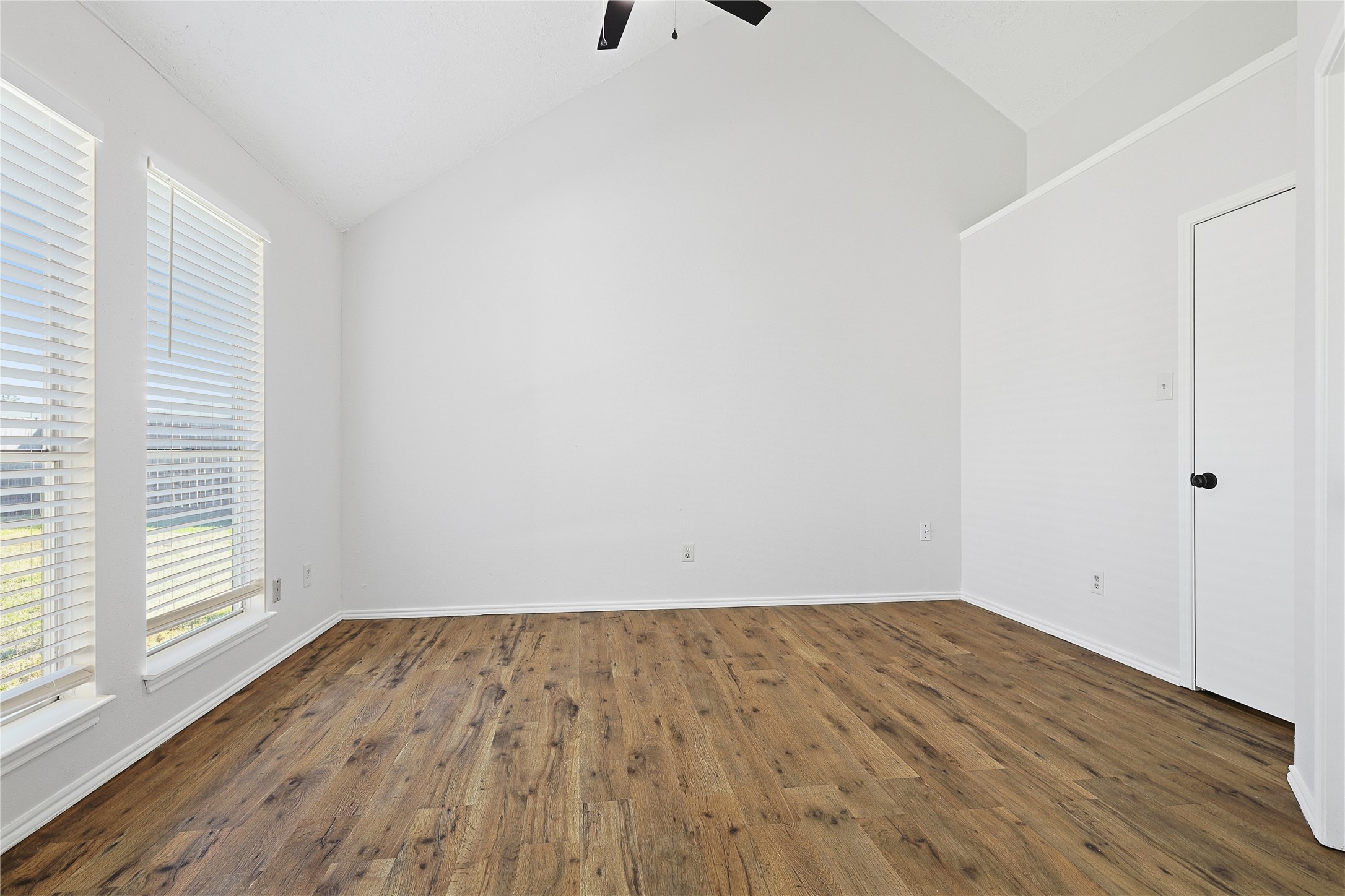 19006 Keyturn Lane Humble, TX 77346 - Photo 13 of 21 a view of room with hardwood floor and window