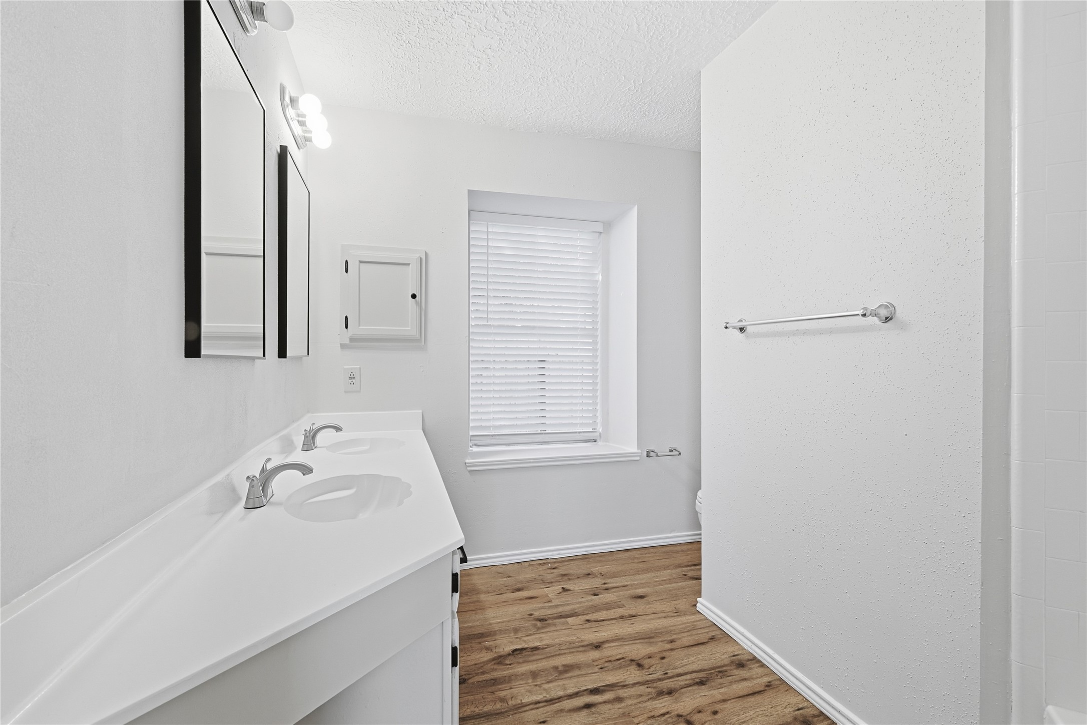 19006 Keyturn Lane Humble, TX 77346 - Photo 15 of 21 a bathroom with a sink and a mirror