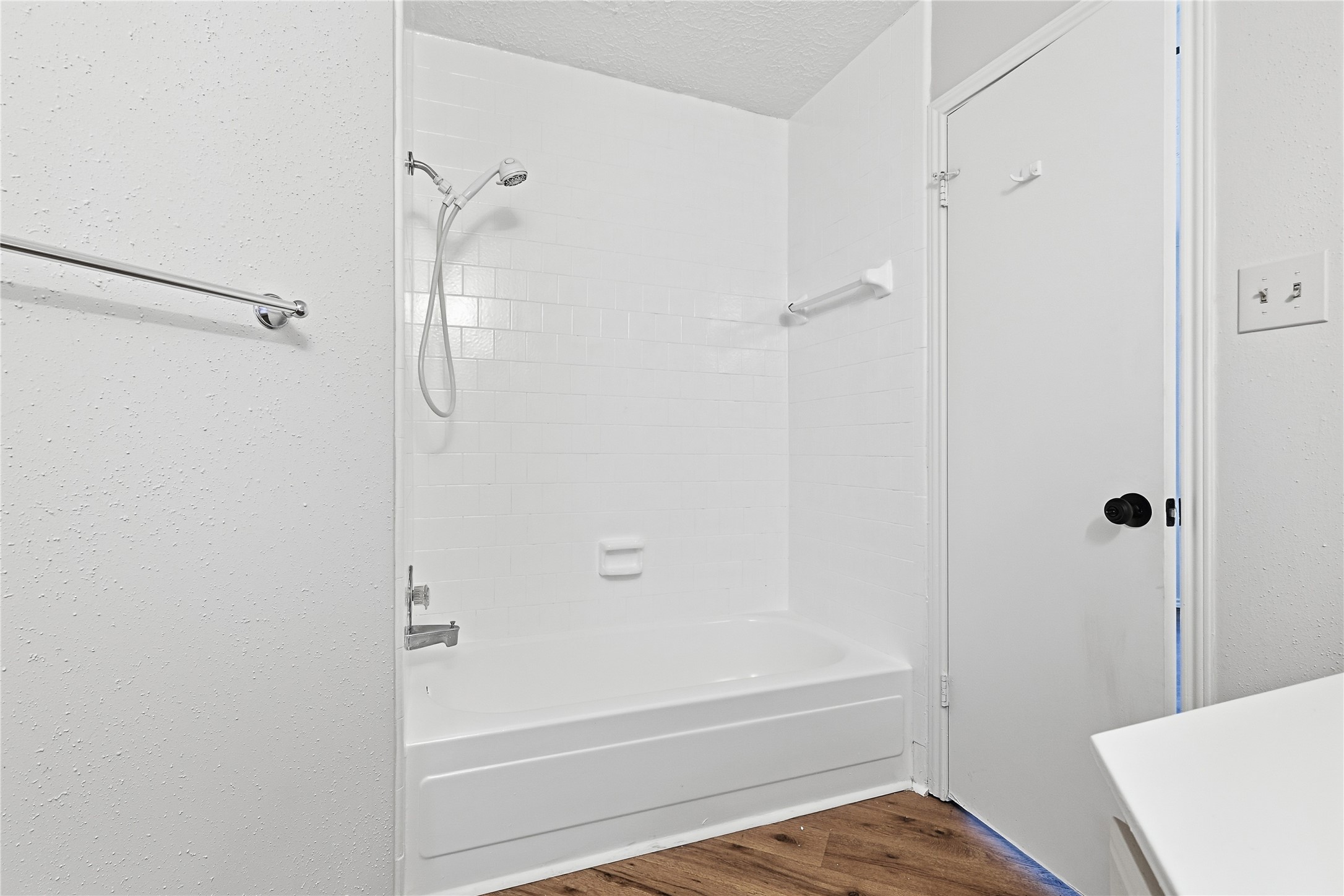 19006 Keyturn Lane Humble, TX 77346 - Photo 16 of 21 a bathroom with a tub and shower