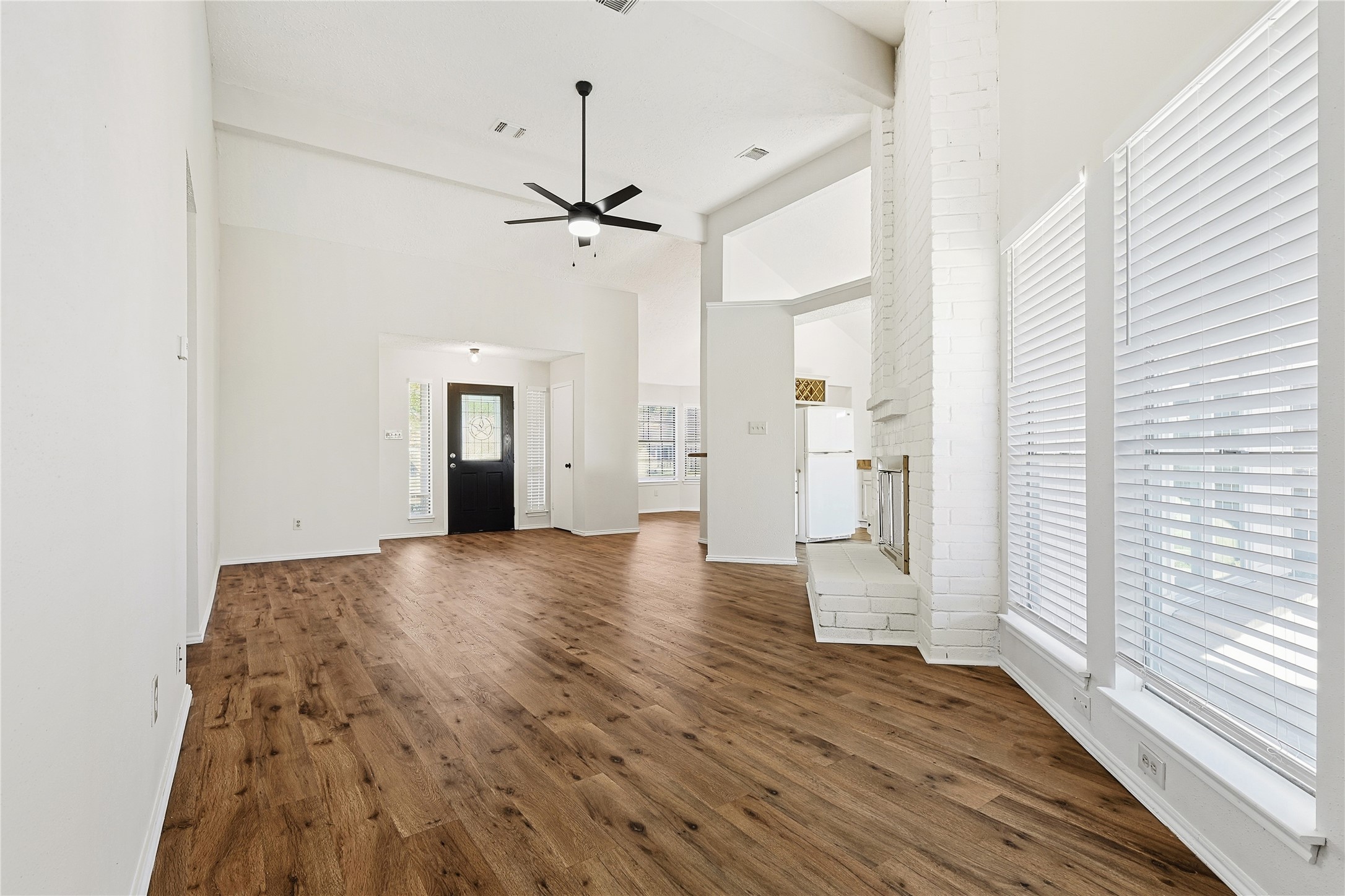 19006 Keyturn Lane Humble, TX 77346 - Photo 5 of 21 a view of empty room with wooden floor and window