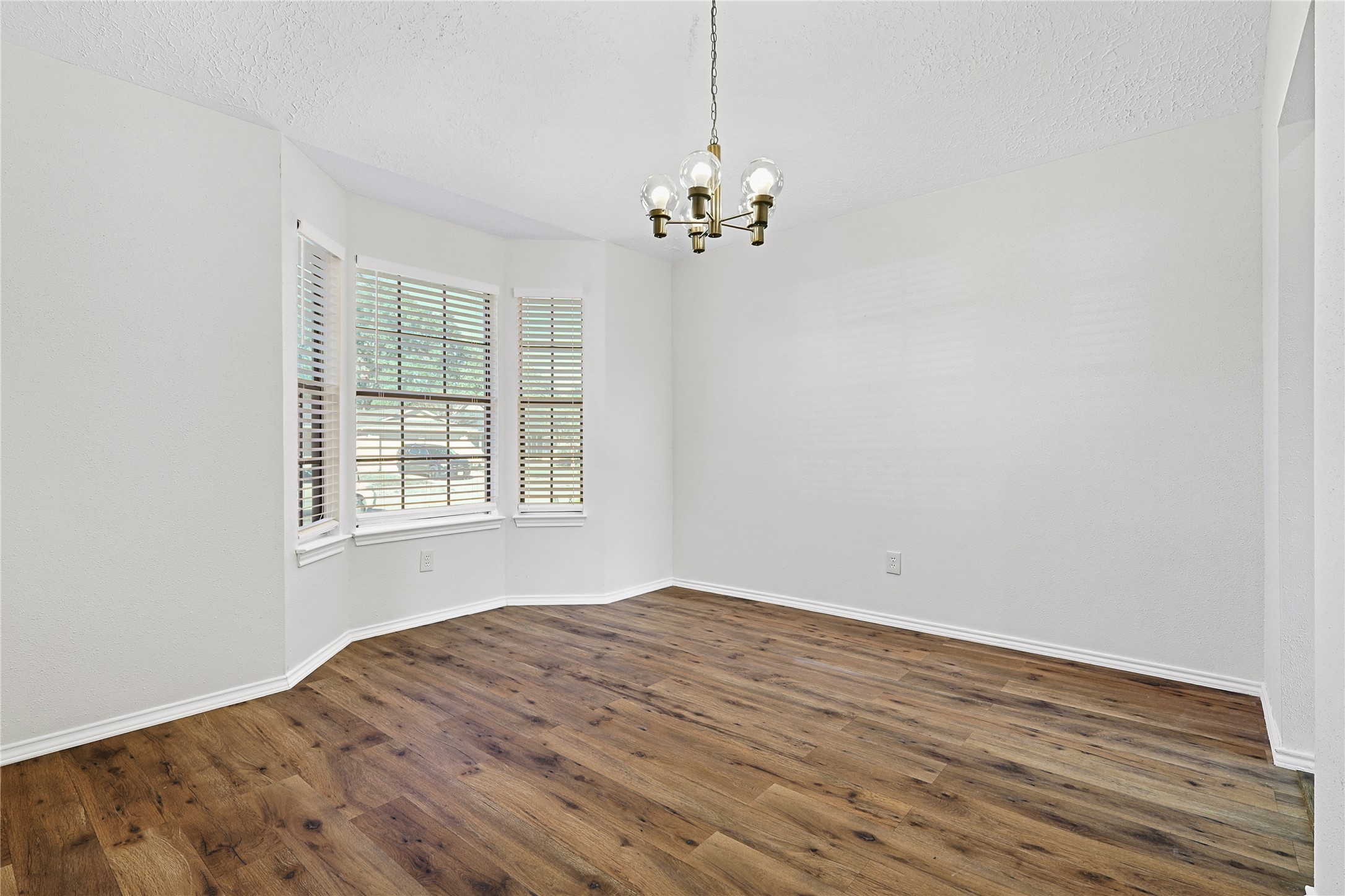19006 Keyturn Lane Humble, TX 77346 - Photo 6 of 21 a view of empty room with wooden floor