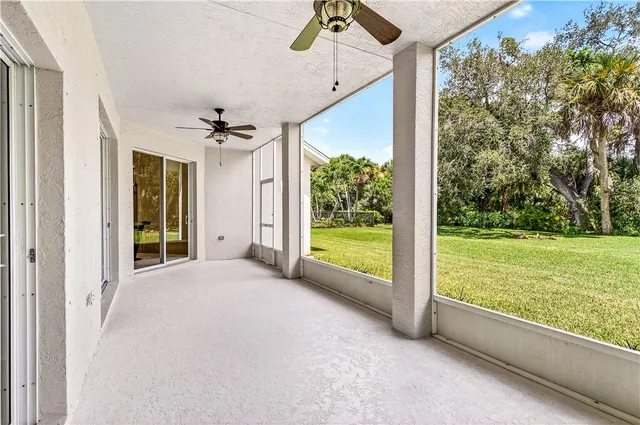 a view of a room with a large window