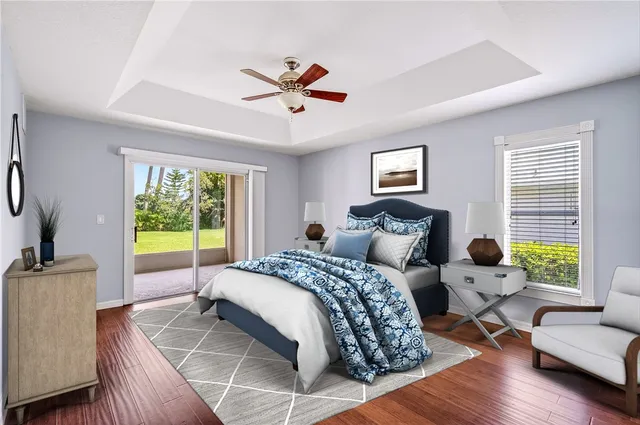 a spacious bedroom with a bed and a couch