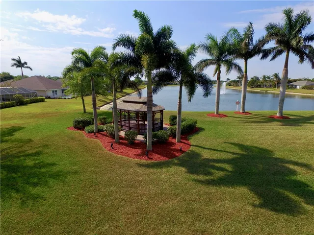 a view of a park with swings and slides