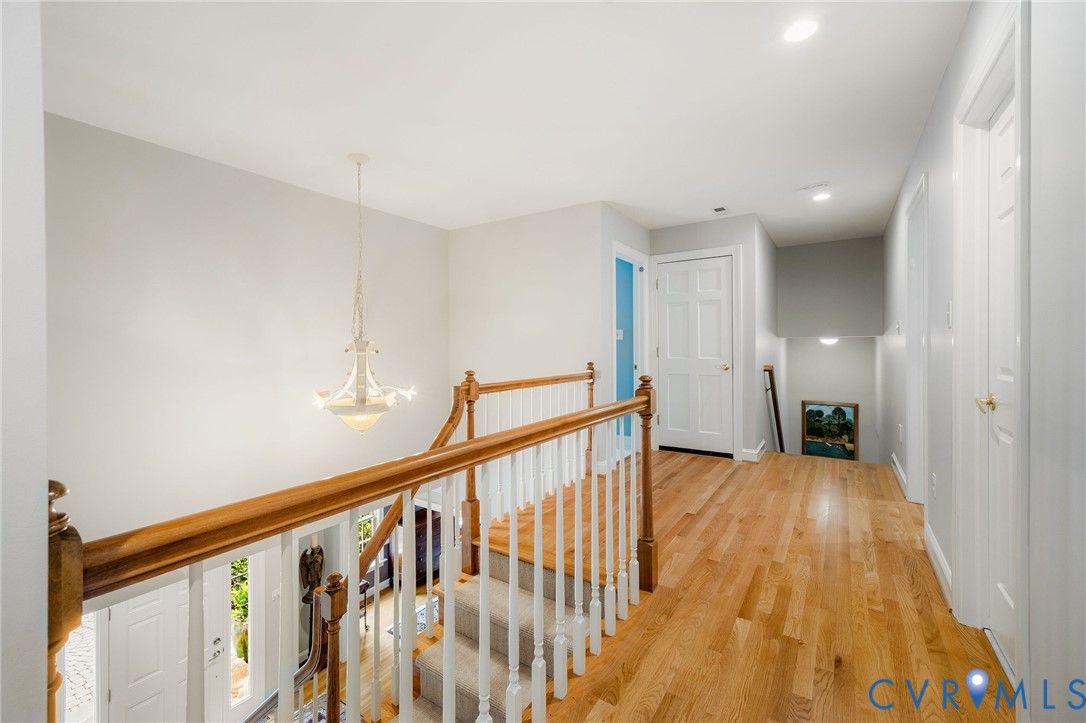 3620 Old Gun Road East Midlothian, VA 23113 - Photo 27 of 56 a view of a hallway with wooden floor and stairs
