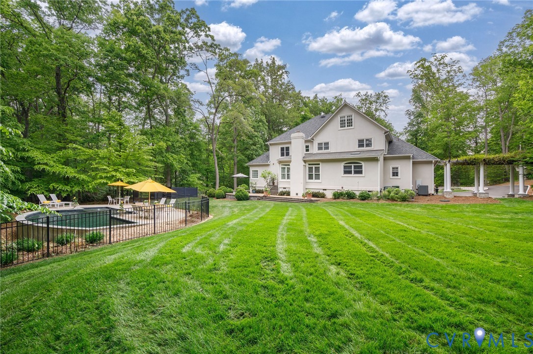 3620 Old Gun Road East Midlothian, VA 23113 - Photo 51 of 56 a view of a house with a yard deck and a patio