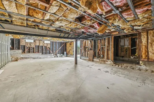a view of a room with wooden walls