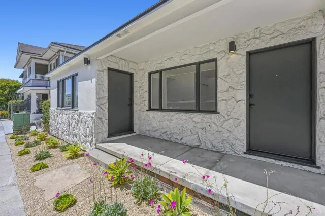 a front view of a house with an outdoor space