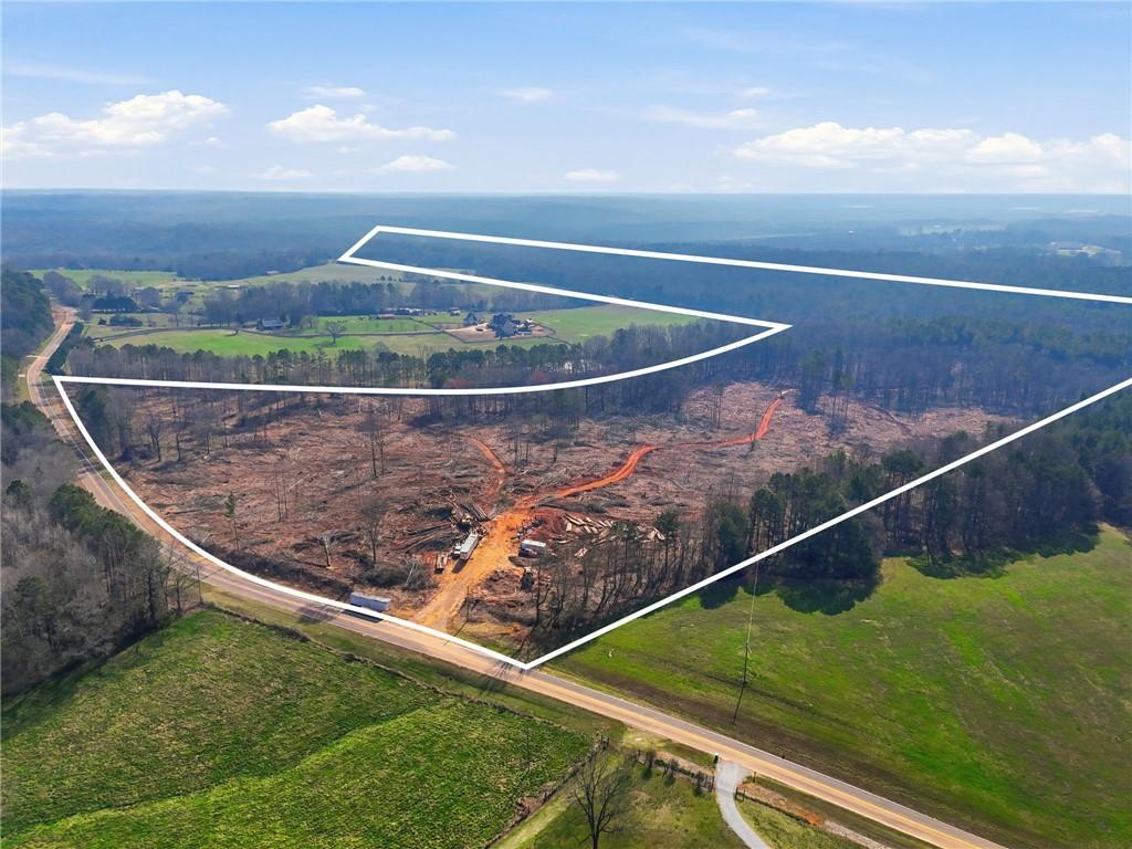 99012 Martin Road Talmo, GA 30575 - Photo 1 of 40 a view of a tennis court