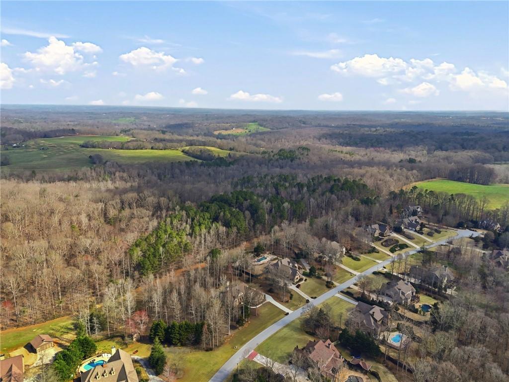 99012 Martin Road Talmo, GA 30575 - Photo 22 of 40 a view of a lake with lots of trees