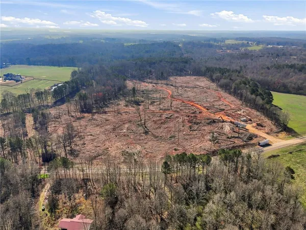 a view of an outdoor space and a mountain view in back