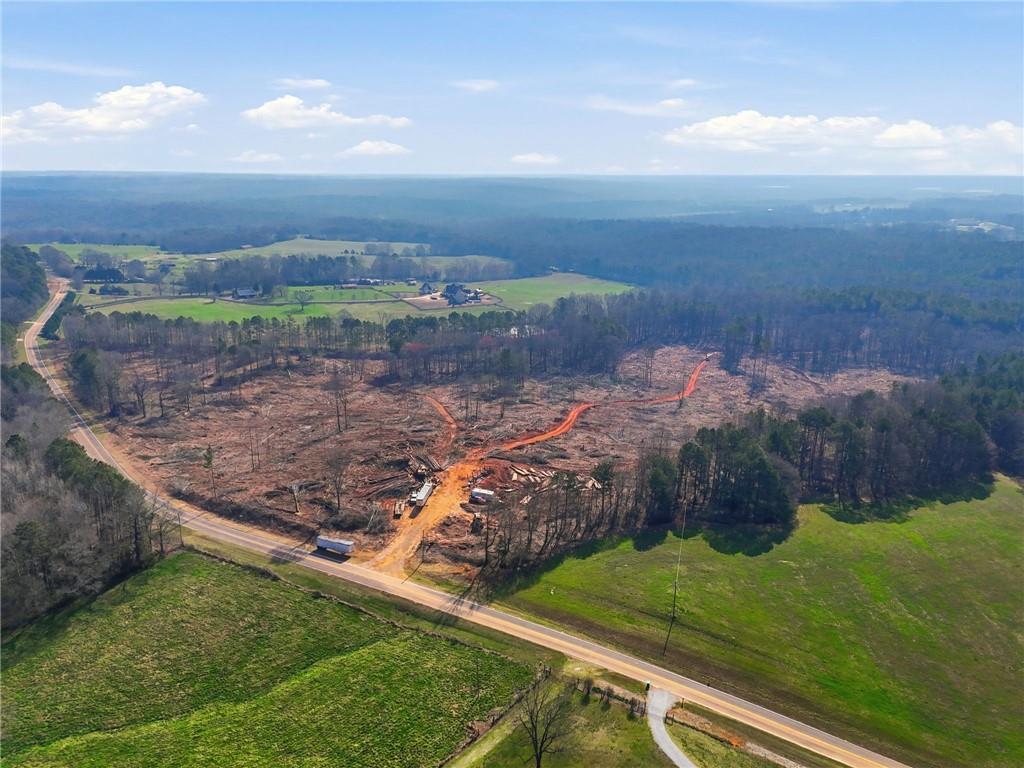 99012 Martin Road Talmo, GA 30575 - Photo 5 of 40 a view of a yard with an outdoor space