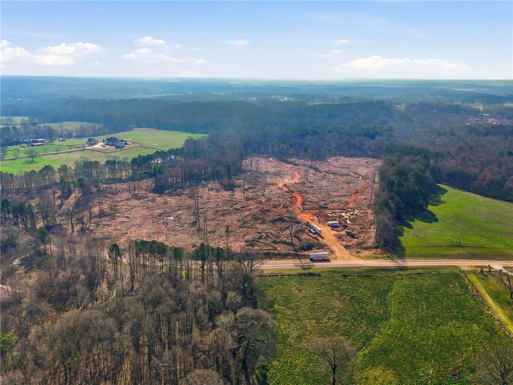 99012 Martin Road Talmo, GA 30575 - Photo 6 of 40 a view of a lake with a yard