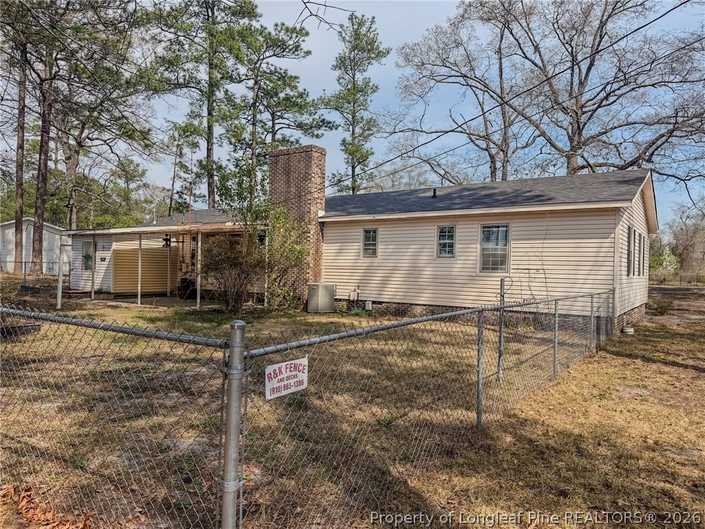 575 Veterans Road St. Pauls, NC 28384 - Photo 22 of 27 front view of a house with a yard
