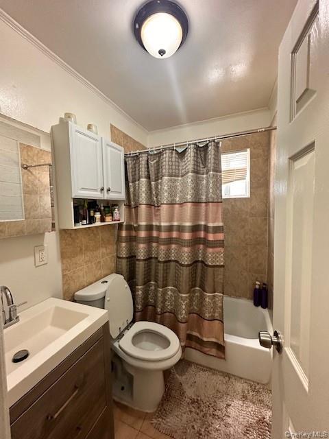 169,34 144th Road Queens, NY 11434 - Photo 12 of 17 a bathroom with a sink a toilet and shower
