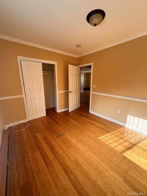 169,34 144th Road Queens, NY 11434 - Photo 8 of 17 a view of empty room with wooden floor