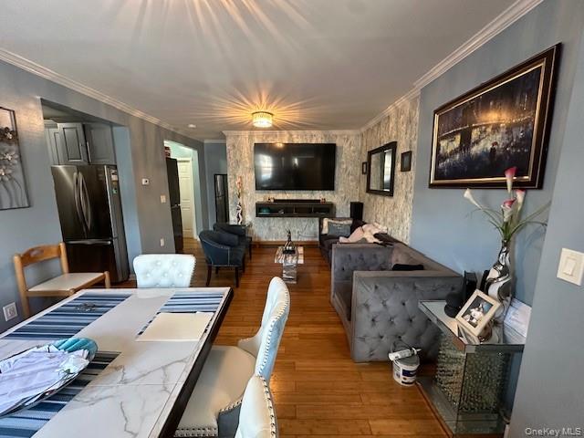 169,34 144th Road Queens, NY 11434 - Photo 9 of 17 a living room with furniture and a flat screen tv