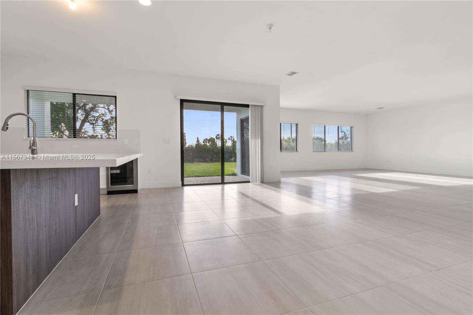 2391 Southwest 123rd Terrace Davie, FL 33325 - Photo 12 of 27 Exit to covered patio