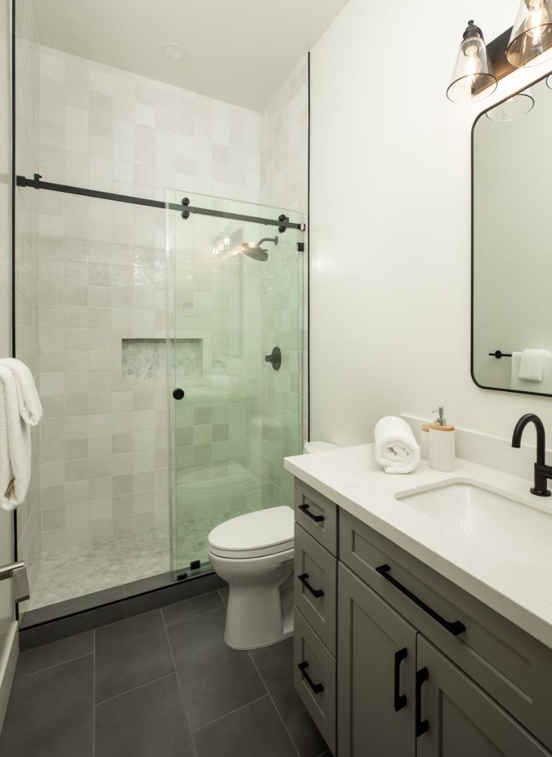 1693 Waterbird Way Sunnyvale, CA 94087 - Photo 16 of 31 a bathroom with a sink a toilet and shower