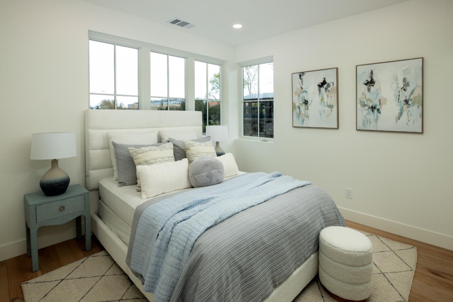 1693 Waterbird Way Sunnyvale, CA 94087 - Photo 20 of 31 a bedroom with a bed and glass window