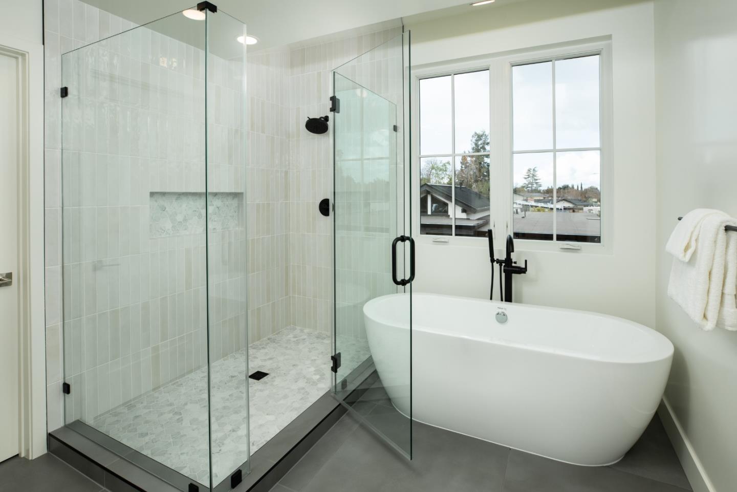 1693 Waterbird Way Sunnyvale, CA 94087 - Photo 24 of 31 a white bath tub sitting next to a shower