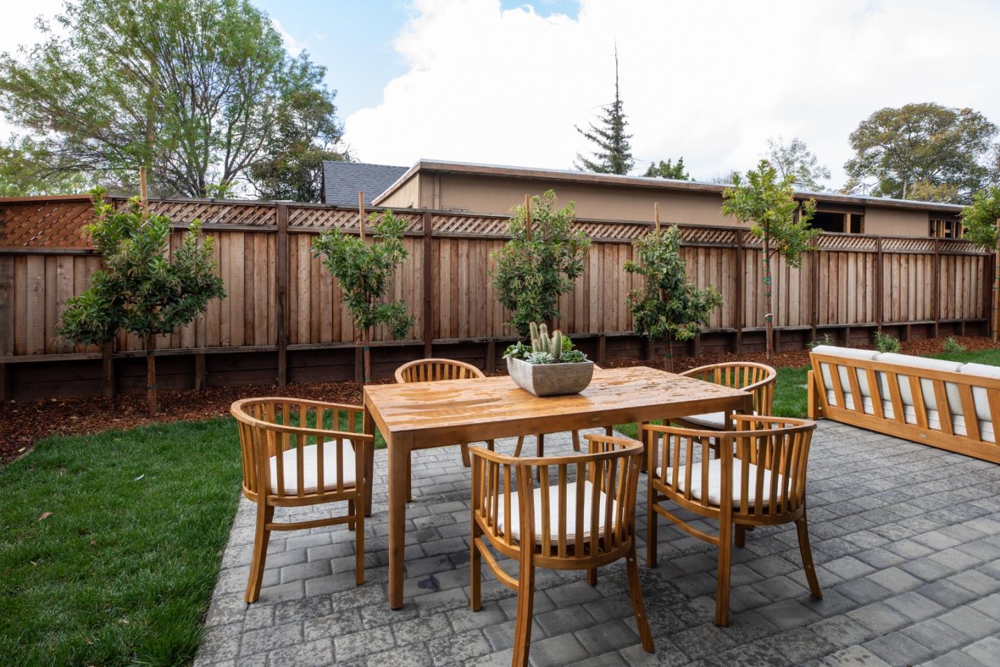 1693 Waterbird Way Sunnyvale, CA 94087 - Photo 26 of 31 a view of a chairs and table in backyard