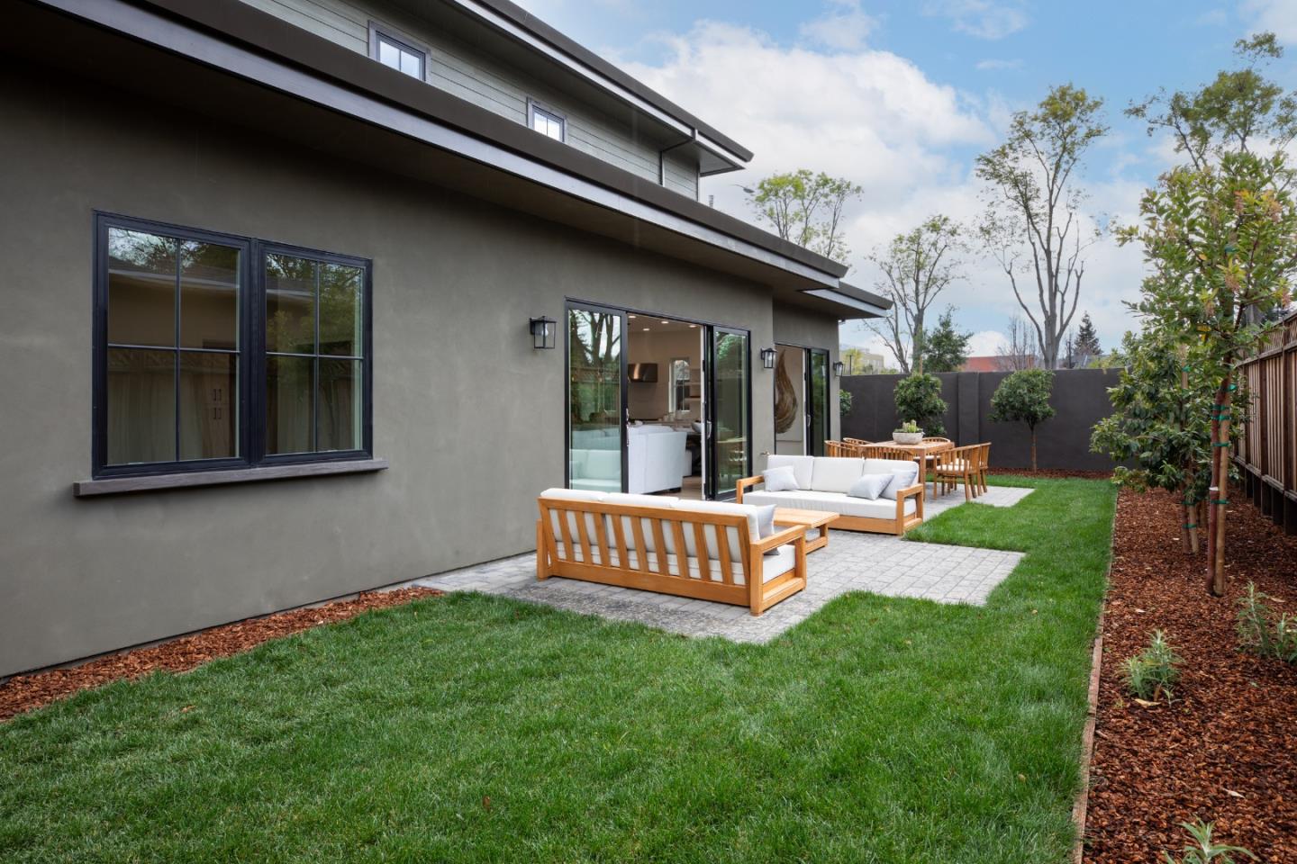 1693 Waterbird Way Sunnyvale, CA 94087 - Photo 29 of 31 a view of an house with backyard porch and furniture