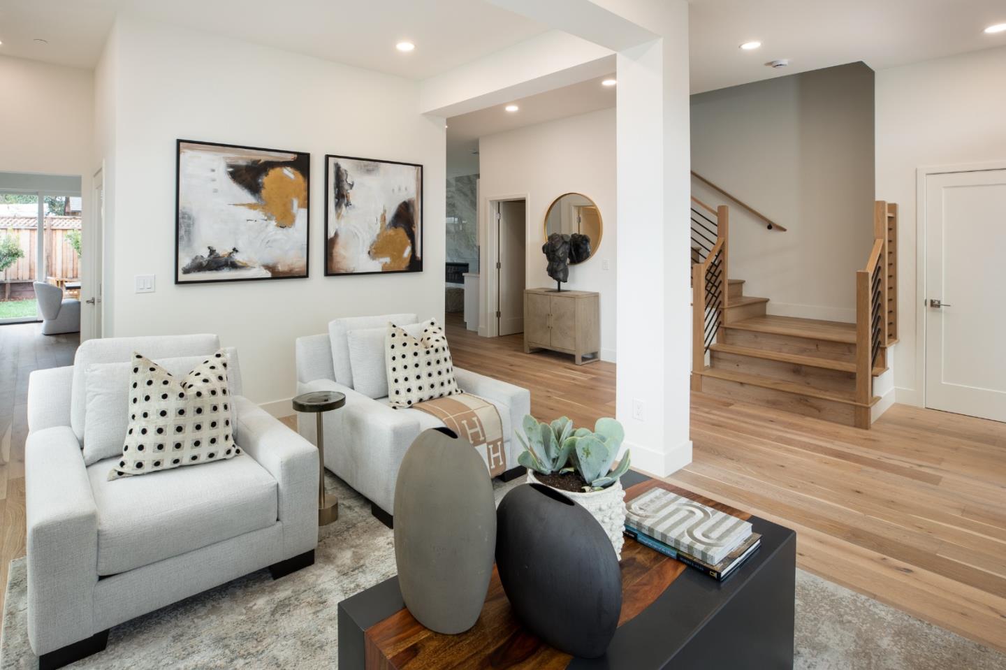 1693 Waterbird Way Sunnyvale, CA 94087 - Photo 5 of 31 a living room with furniture and wooden floor