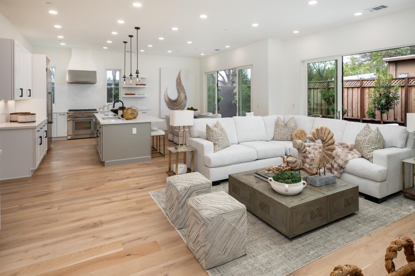 1693 Waterbird Way Sunnyvale, CA 94087 - Photo 8 of 31 a living room with furniture kitchen and a large window