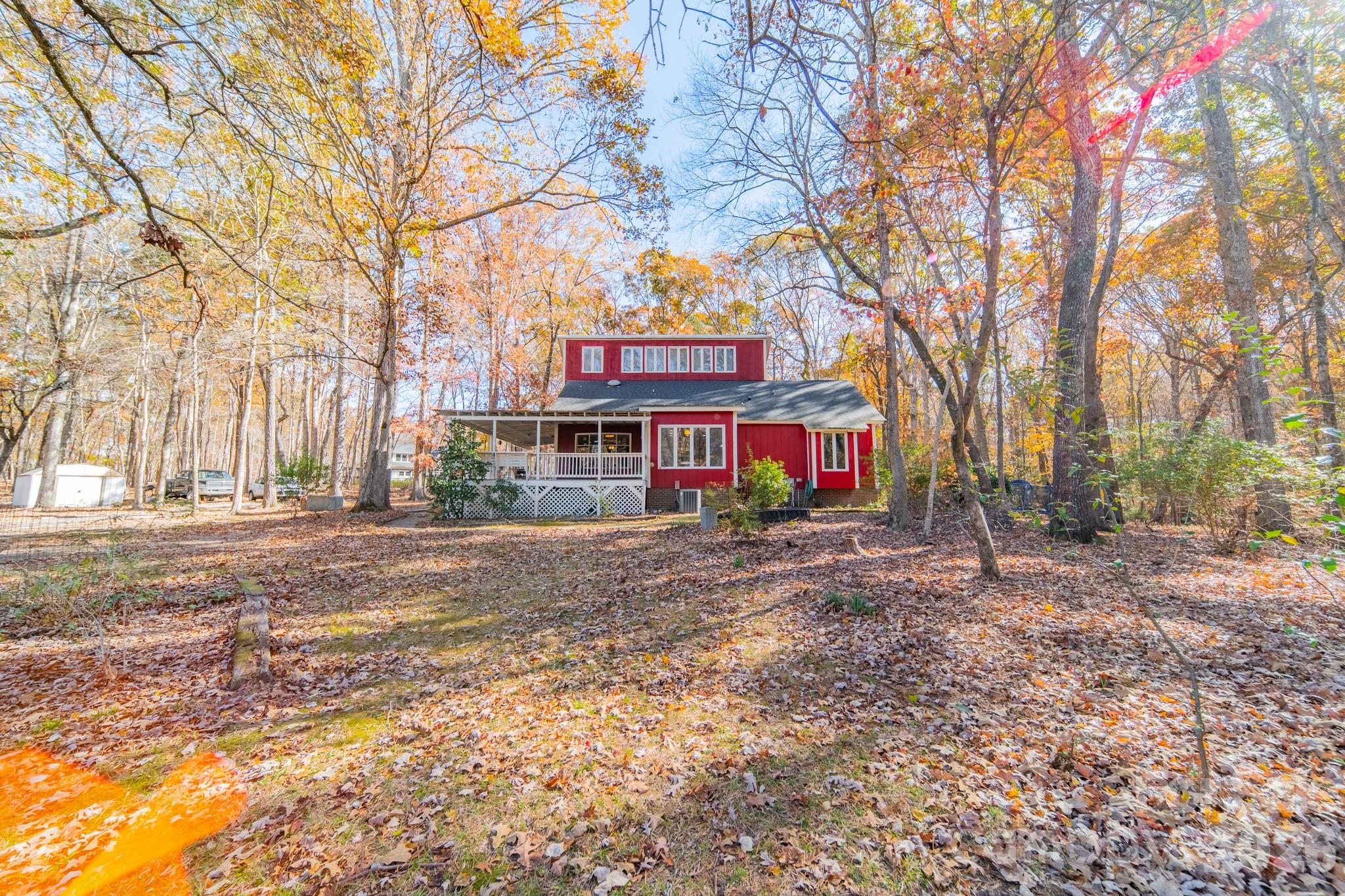 6524 The Little Road Waxhaw, NC 28173 - Photo 12 of 25 a front view of a house with a yard