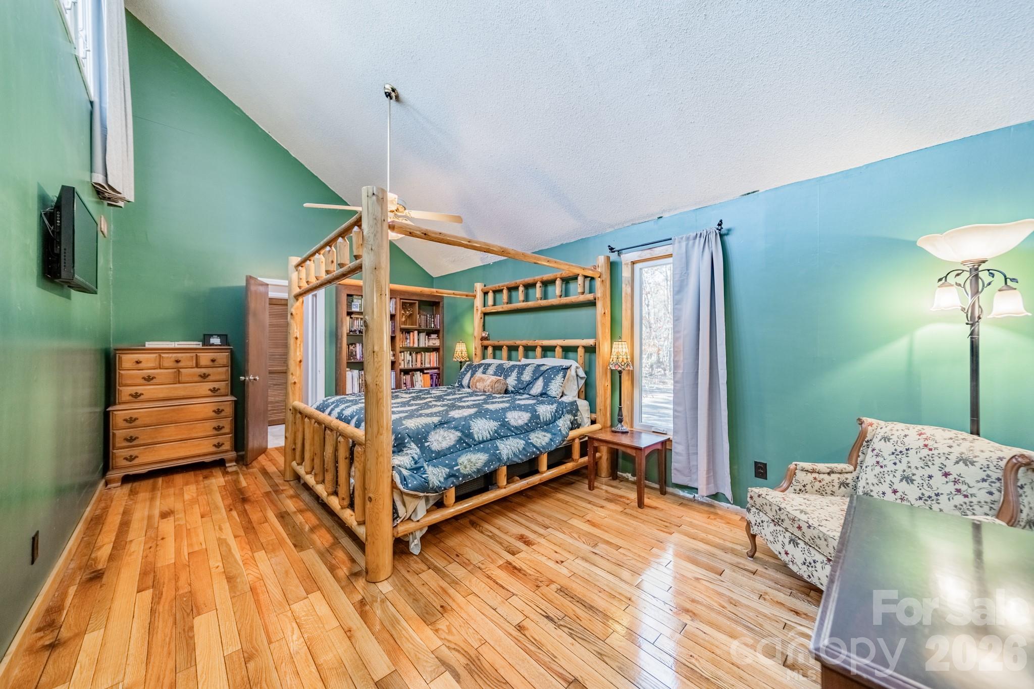 6524 The Little Road Waxhaw, NC 28173 - Photo 22 of 25 a bed room with a bed and a chair