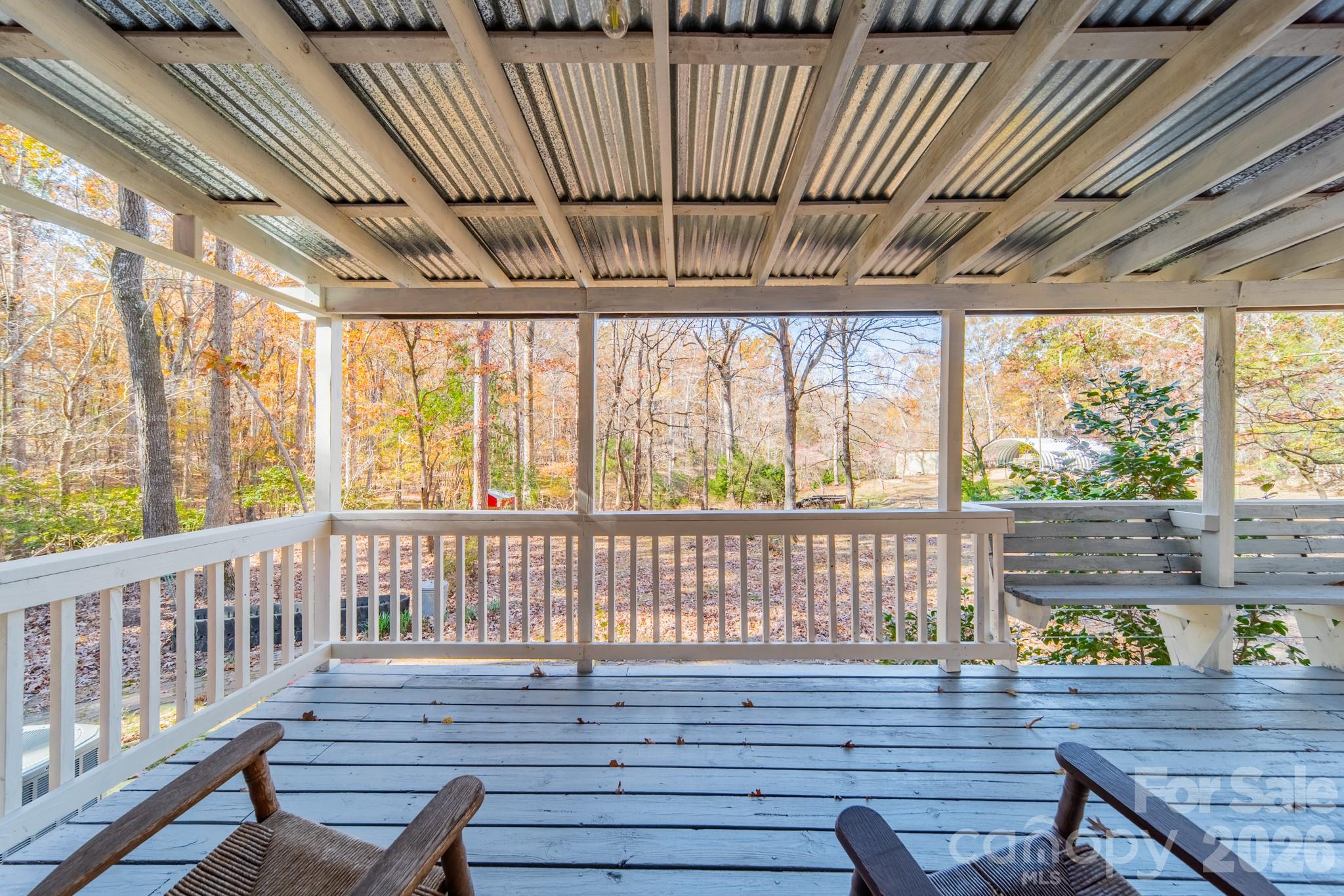 6524 The Little Road Waxhaw, NC 28173 - Photo 24 of 25 a view of a porch with wooden floor