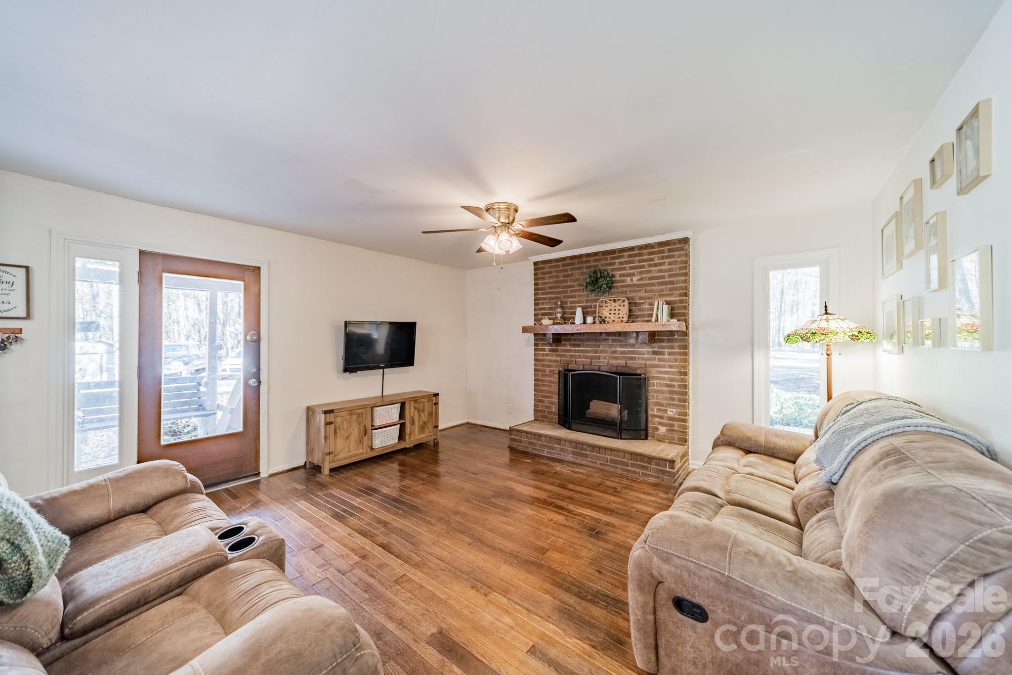 6524 The Little Road Waxhaw, NC 28173 - Photo 25 of 25 a living room with furniture fireplace and flat screen tv