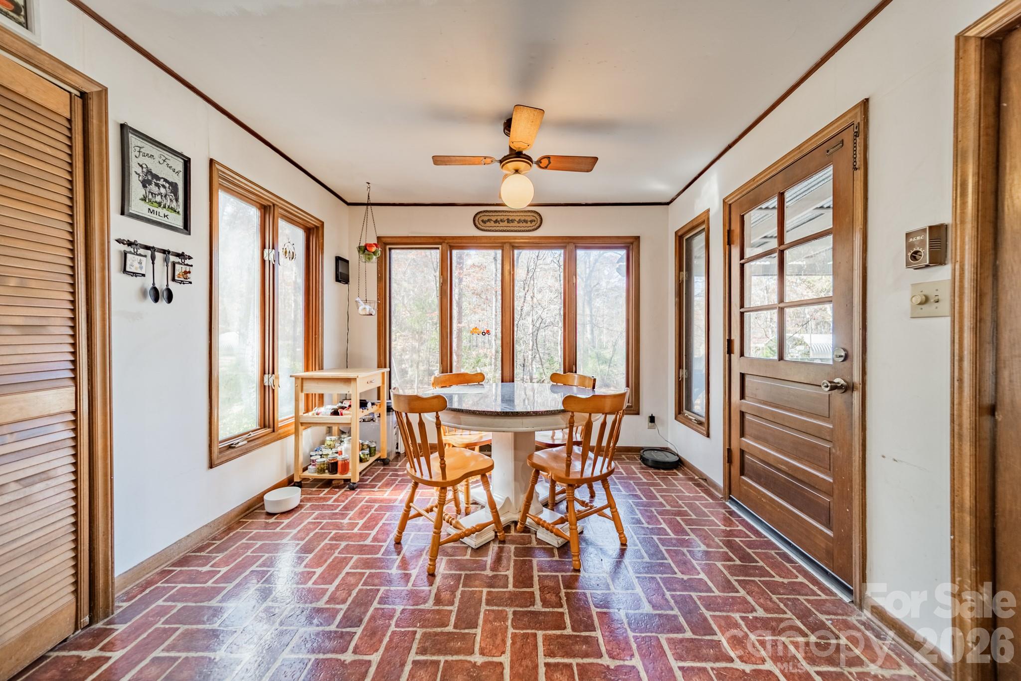 6524 The Little Road Waxhaw, NC 28173 - Photo 8 of 25 a view of a dining room with furniture window and wooden floor